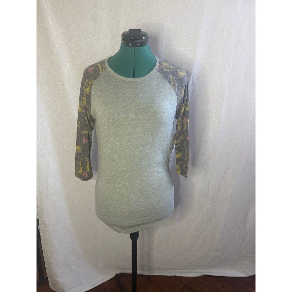 NWT Lularoe Randy top size extra small. Brand new with tags